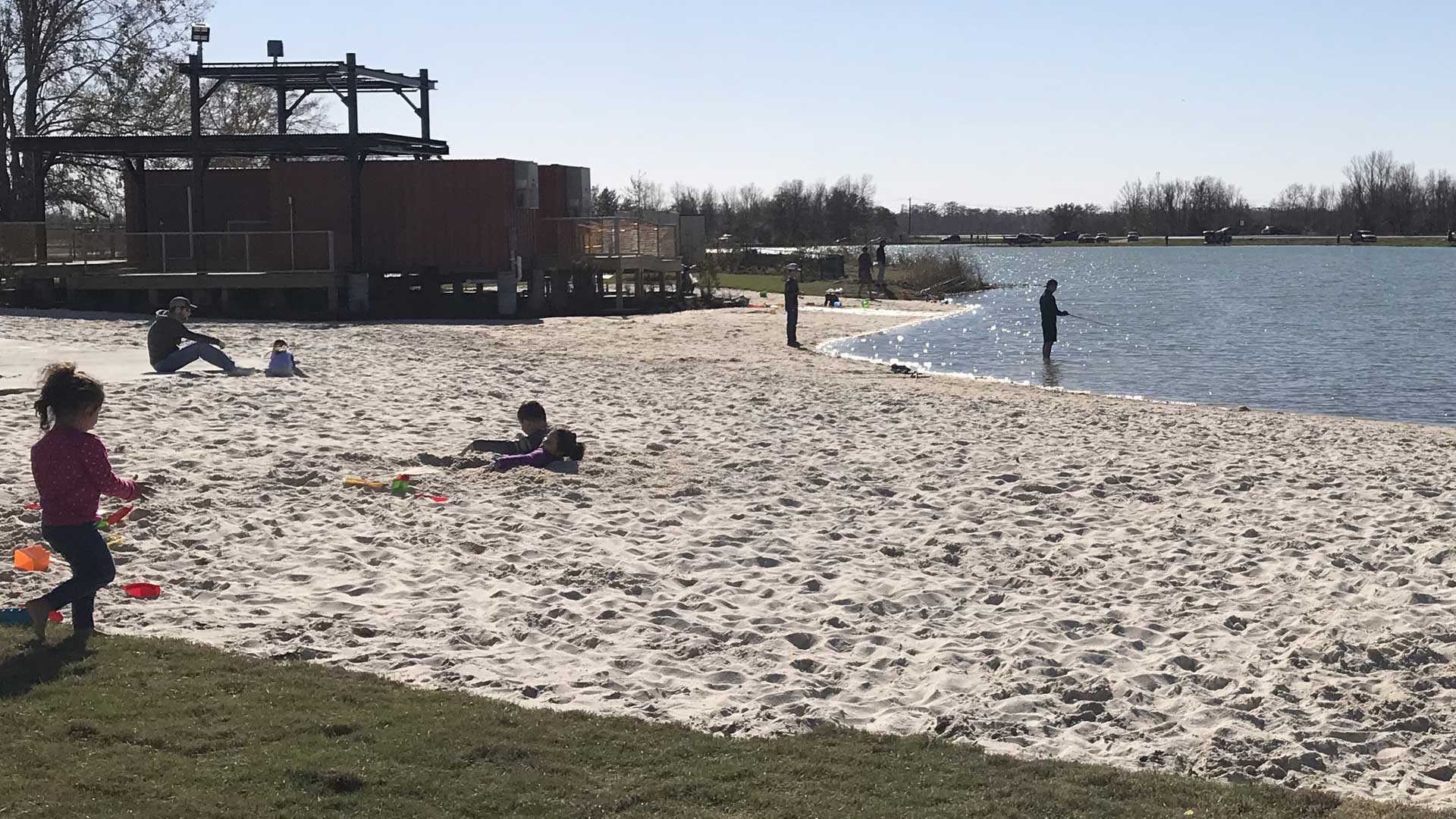 Photo of people in sand at BCSP beach.