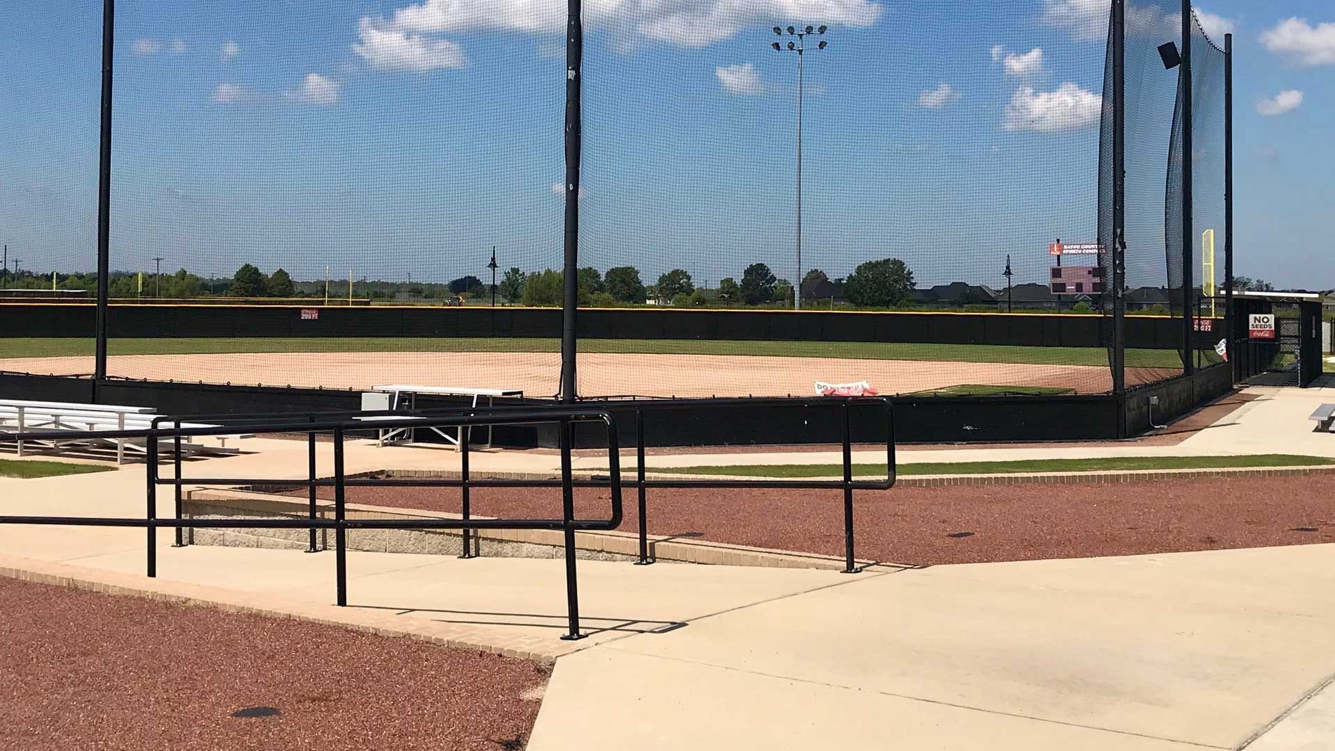 Photo of spectator area and softball field.